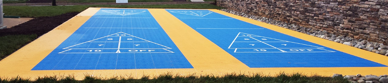 multi-purpose game court in the backyard of a home
