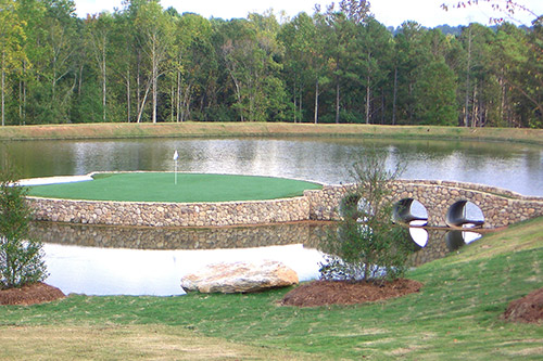 beautiful golf course hole on a lake