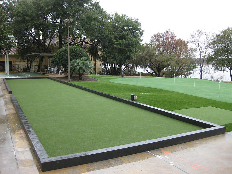 bocce court next to a putting green