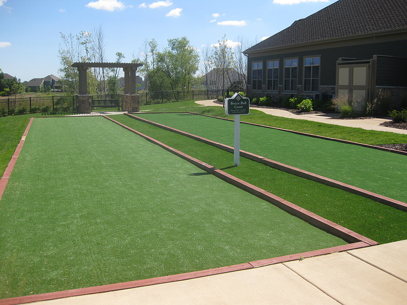 two bocce courts in a park setting
