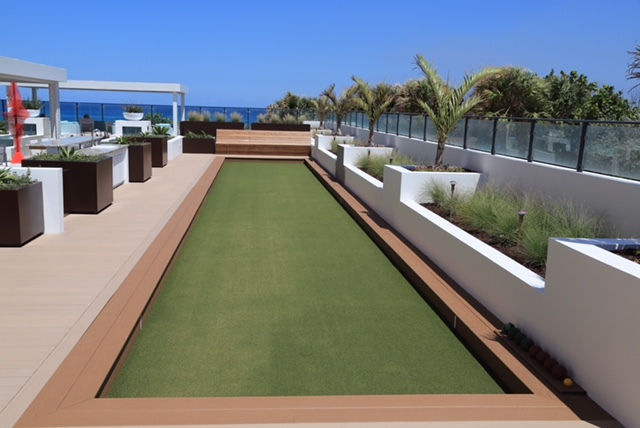 bocce court in a nice yard by the sea