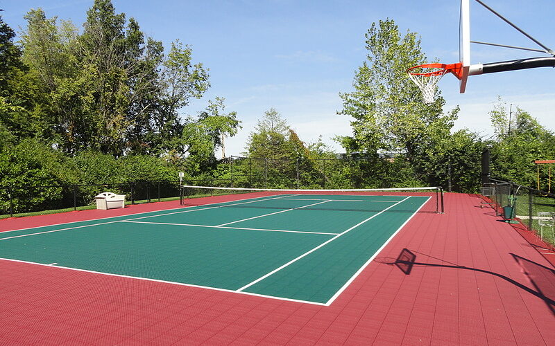 versacourt tennis court with basketball hoop